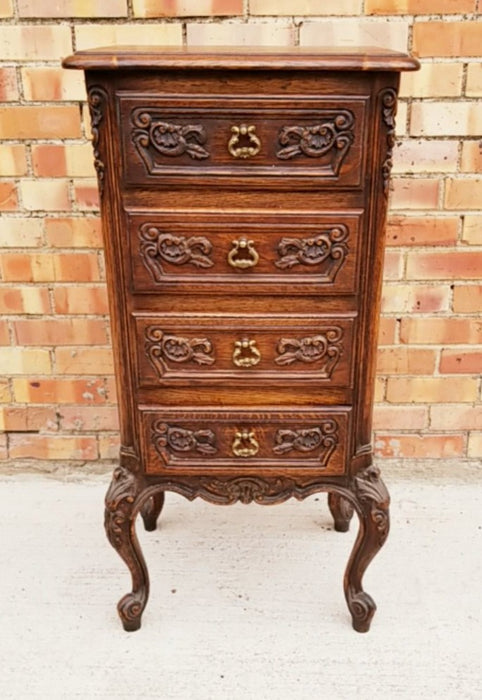 4 DRAWER COUNTRY FRENCH CARVED OAK LINGERIE CHEST WITH TALL LEGS - MID 20TH CENTURY