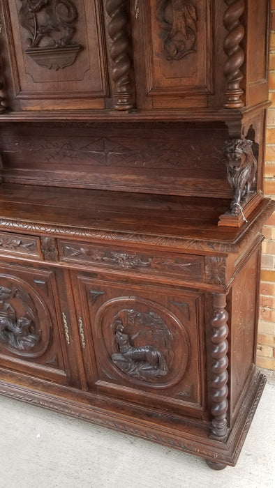 LOUIS XIII FOX AND HOUND CARVED OAK BUFFET WITH BARLEY TWIST AND LION SUPPORTS