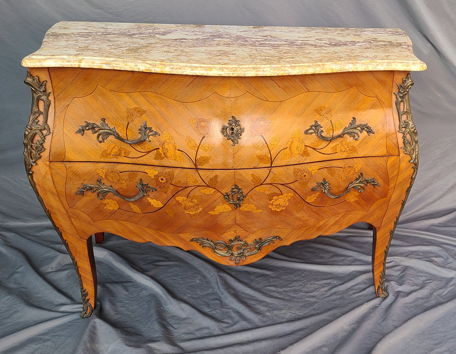 LOUIS XV MARBLE TOP MAHOGANY BOMBE CHEST WITH FLORAL MARQUETRY AND ORMOLU