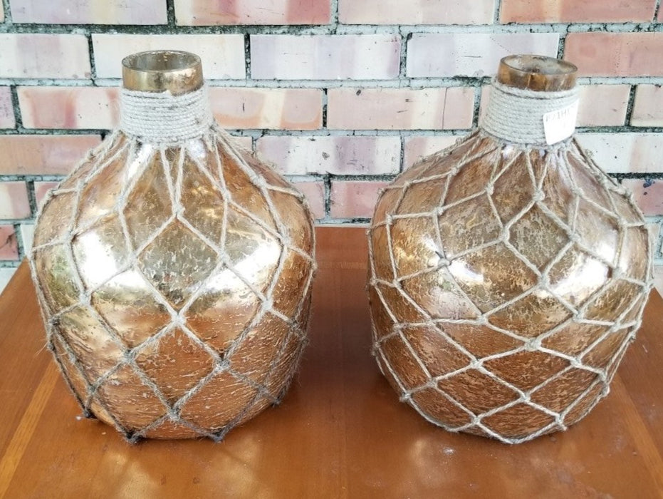 GOLD GLASS BOTTLE IN NET