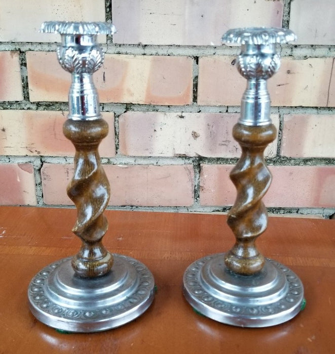 PAIR OF SMALL BARLEY TWIST WITH SILVER CANDLE STANDS