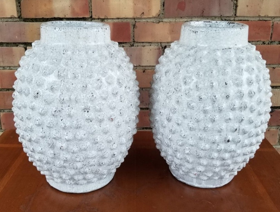 PAIR OF WHITE GLAZED KNOBBY POTTERY VASESPOTTER