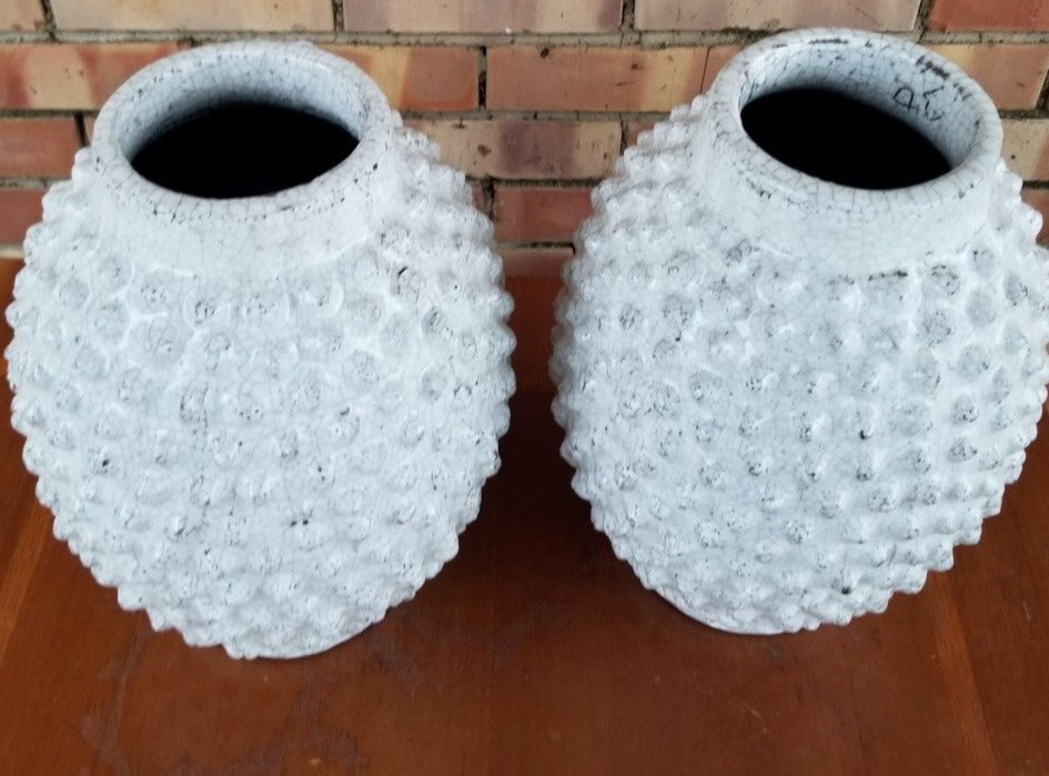 PAIR OF WHITE GLAZED KNOBBY POTTERY VASESPOTTER