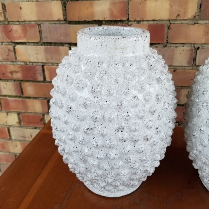 PAIR OF WHITE GLAZED KNOBBY POTTERY VASESPOTTER