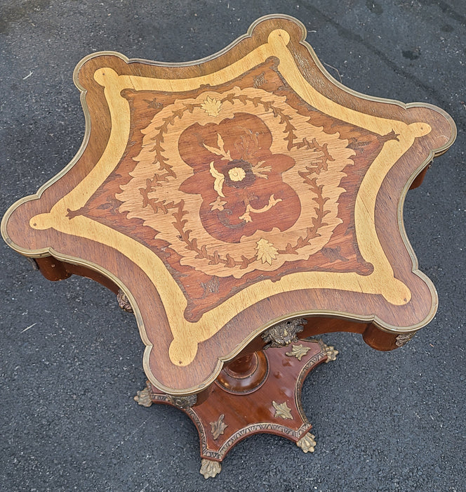 INLAID SCALLOPED TOP PEDESTAL TABLE WITH BRASS FIGURAL ORMOLU