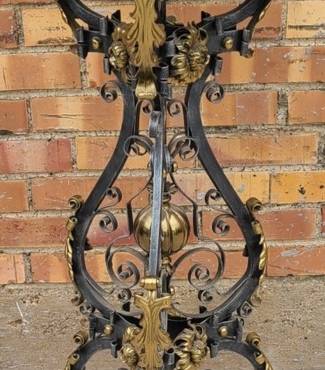 ORNATE IRON AND BRASS STAND WITH EMBOSSED METAL TOP