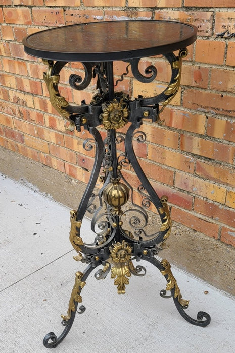 ORNATE IRON AND BRASS STAND WITH EMBOSSED METAL TOP