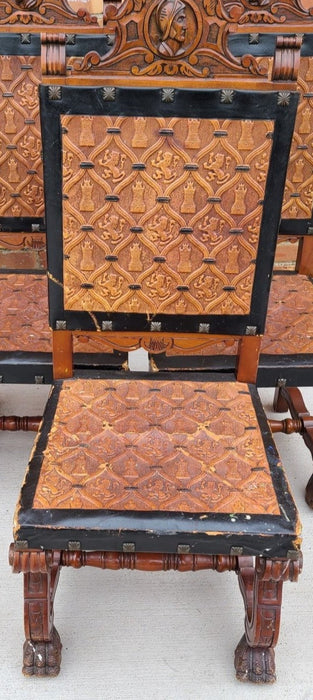 PAIR OF LEATHER SEAT KNIGHT THEME CHAIRS