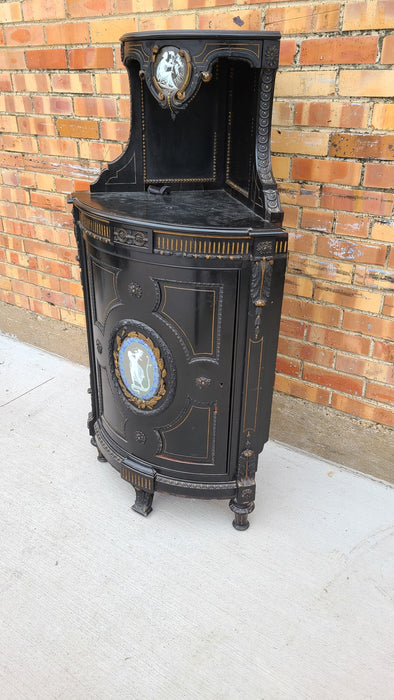 EBONIZED FRENCH NAPOLEON CORNER CABINET WITH CLASSICAL ADOURNMENT