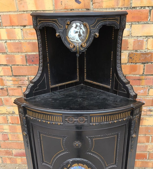 EBONIZED FRENCH NAPOLEON CORNER CABINET WITH CLASSICAL ADOURNMENT