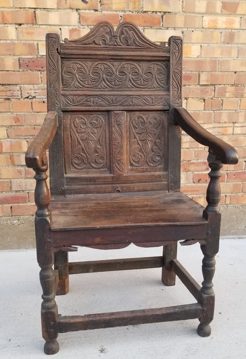 EARLY FRET CARVED OAK HIGH BACKARM CHAIR