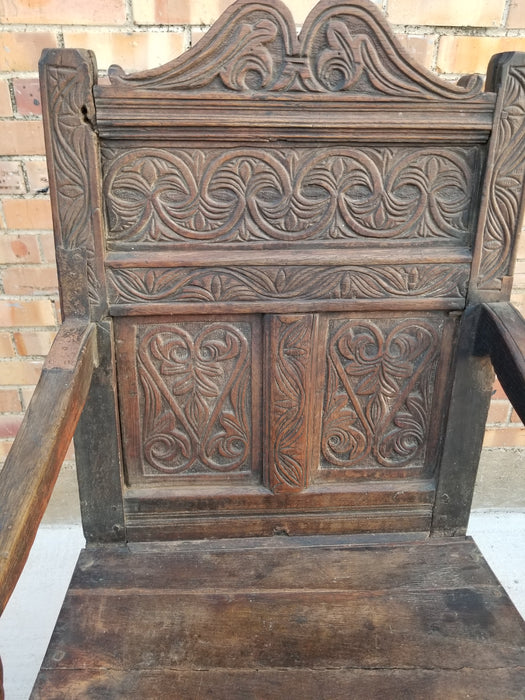 EARLY FRET CARVED OAK HIGH BACKARM CHAIR