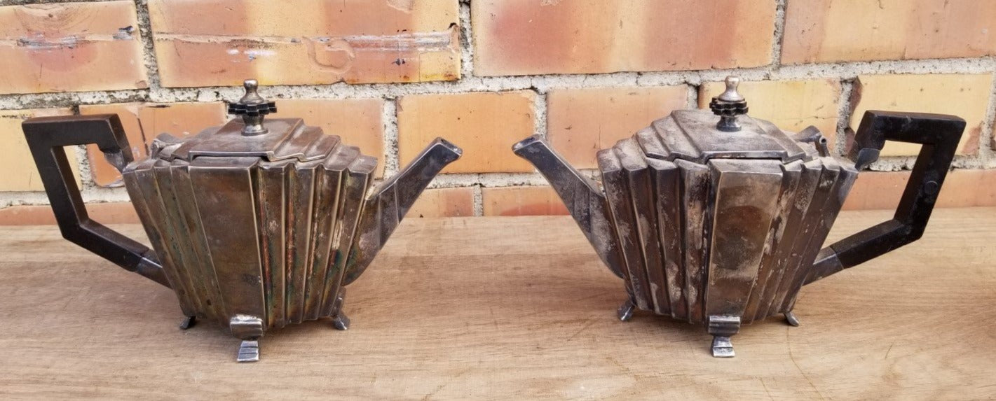 PAIR OF FUNKY SILVER PLATE TEA POTS