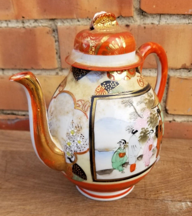 JAPANESE ORANGE TEAPOT WTH PEOPLE