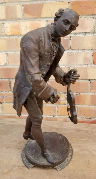 SPELTER MAN WITH VIOLIN STATUE-AS FOUND