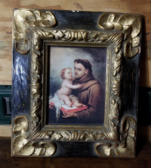 SMALL BLACK AND GOLD CARVED WOOD FRAME