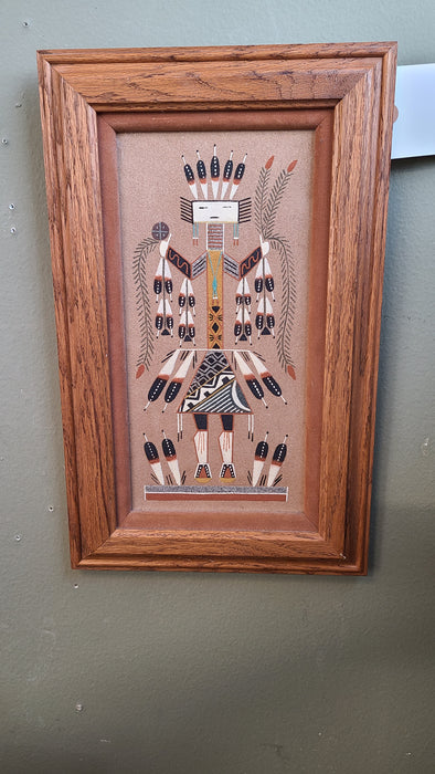 NARROW NAVAJO SAND PAINTING WITH FIGURE IN FEATHERS