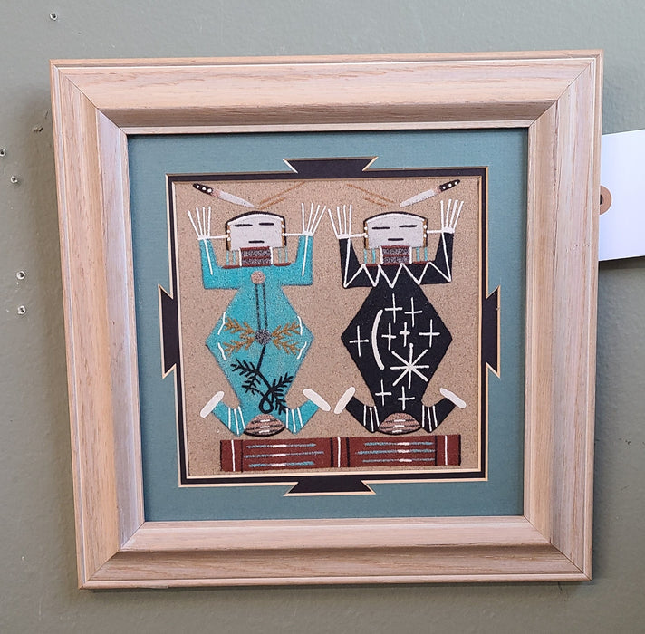 SMALL NAVAJO SAND PAINTING OF SINGLE FIGURE WITH TURQUOISE MATTING