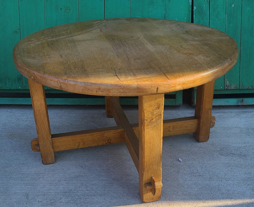 THROUGH TENONED ROUND RUSTIC OAK LOW TABLE