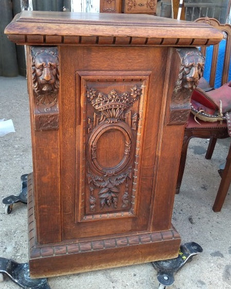 LARGE CARVED PEDESTAL WITH DOOR