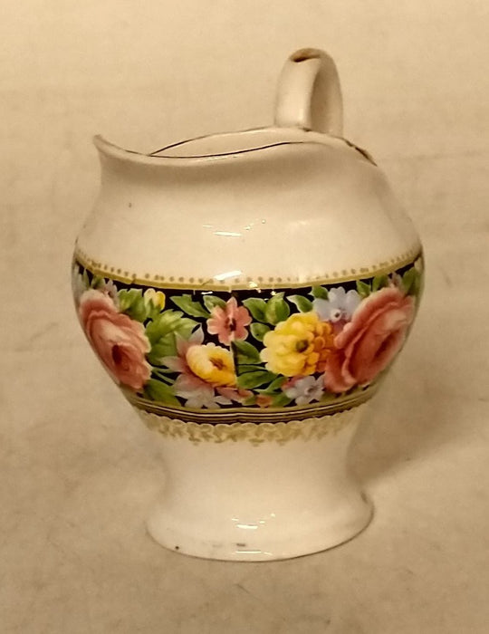 SMALL PAINTED PORCELAIN PITCHER