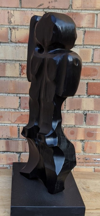 ABSTRACT WOOD SCULPTURE IN BLACK