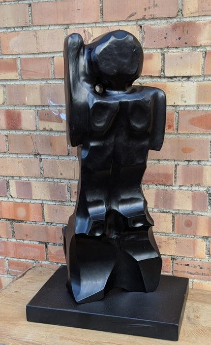 ABSTRACT WOOD SCULPTURE IN BLACK