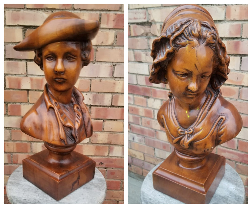 PAIR OF CARVED WOOD BUSTS OF BOY AND GIRL