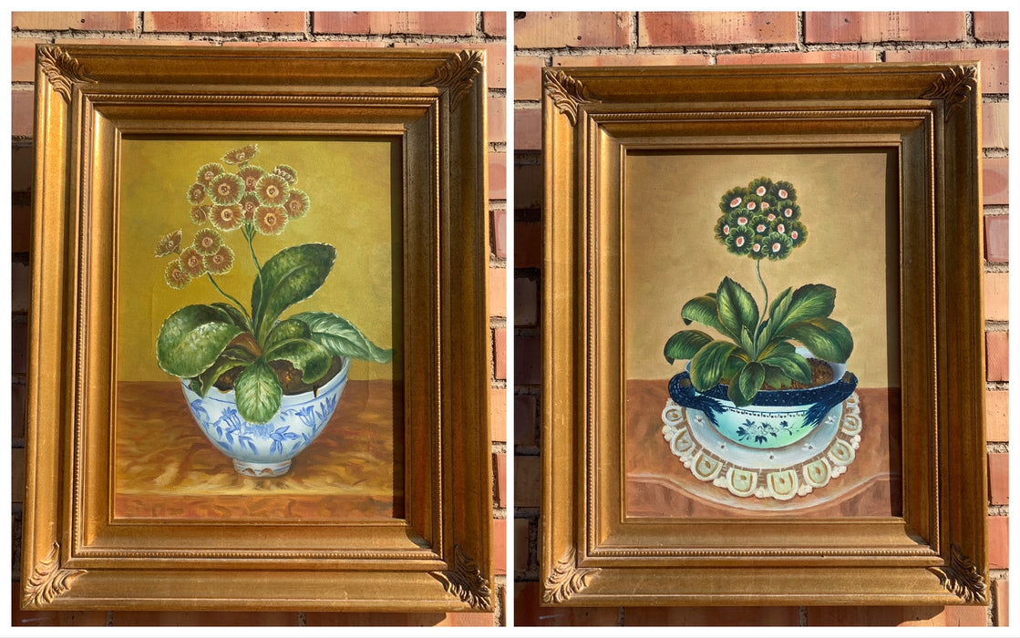 PAIR OF VERTICAL GOLD FRAMED BOTANICAL PRINTS