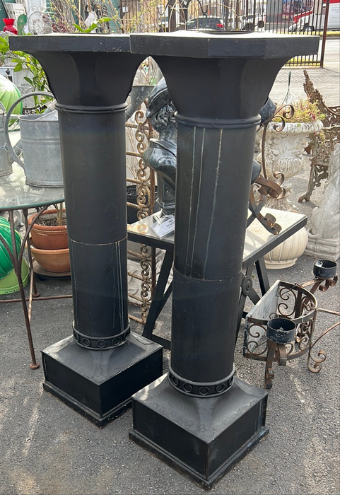 PAIR OF BLACK METAL COLUMNS WITH PLANTER TOPS