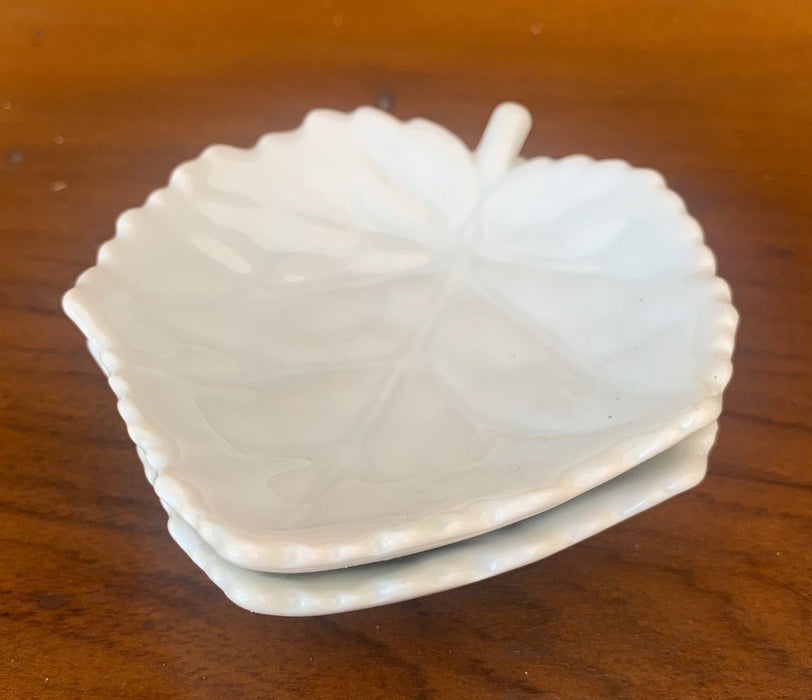 PAIR OF TINY WHITE CERAMIC LEAF DISHES