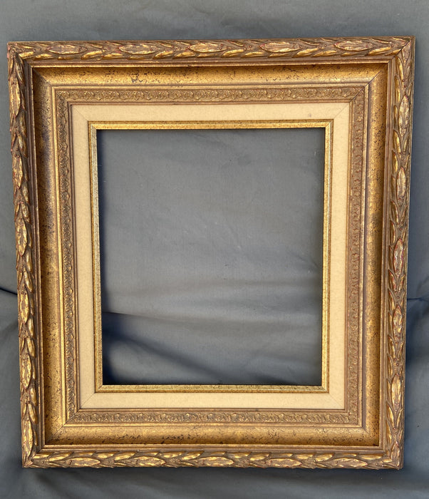 GOLD FRAME WITH OUTER LAURELING AND LINEN LINER