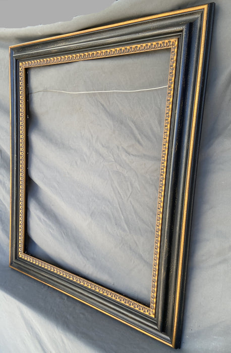 LARGE BLACK AND GOLD FRAME WITH INNER DESIGN