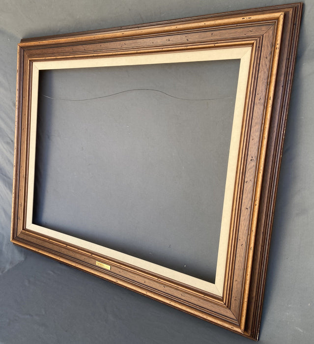 LARGE BROWN FRAME WITH LINEN LINER AND SMALL GOLD PLAQUE "W.A. SLAUGHTER"