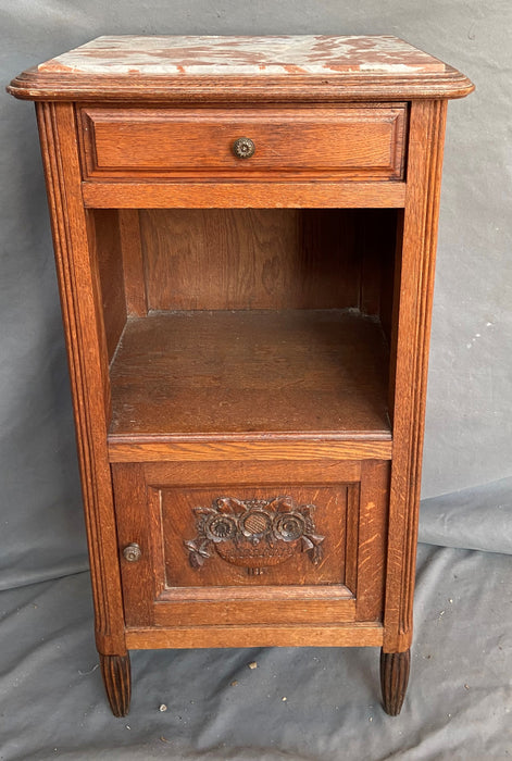 BOUQUET CARVED OAK SIDE CABINET WITH MARBLE TOP AND ENAMEL LINED INTERIOR