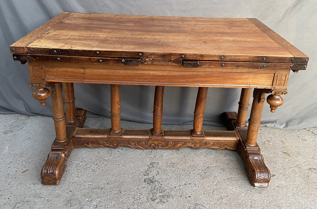 FRENCH RENAISSANCE REVIVAL WALNUT TABLE WITH COLUMN SUPPORTS AND SCROLL ACCENTS