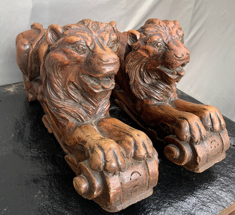 PAIR OF CARVED FRENCH OAK LIONS