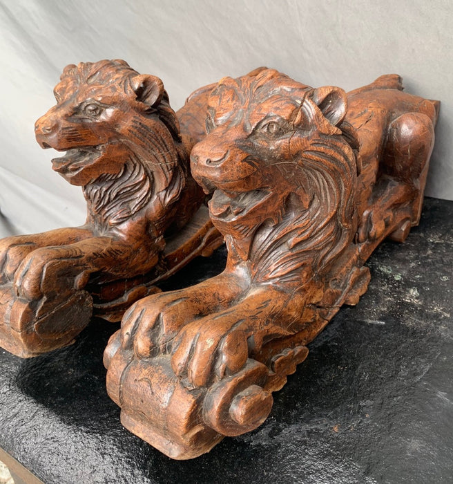 PAIR OF CARVED FRENCH OAK LIONS