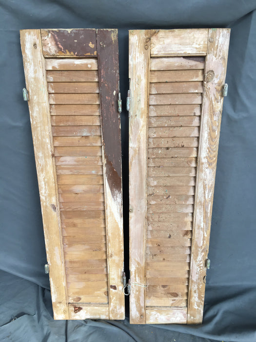 PAIR OF SHUTTERS WITH BROWN PAINT