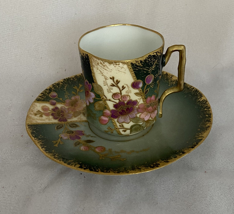 GREEN DEMITASSE WITH PURPLE AND PINK FLOWERS AND SAUCER