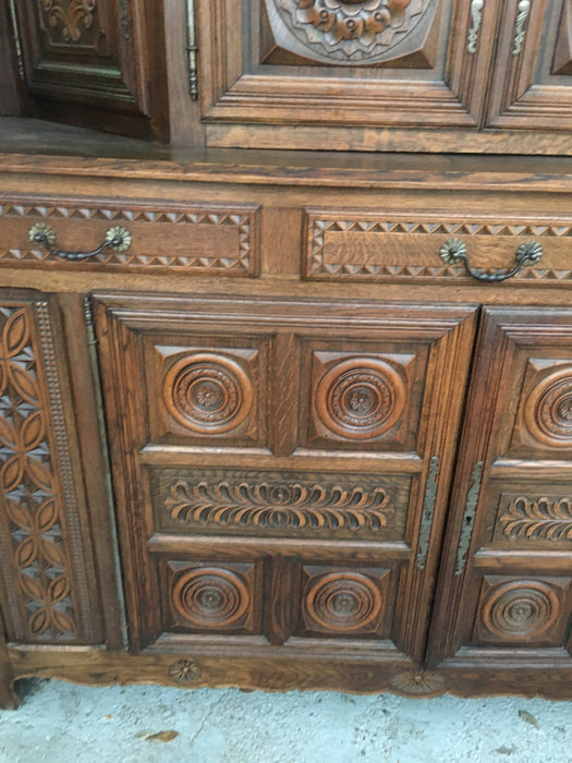 RENAISSANCE REVIVAL CARVED OAK COURT CUPBOARD WITH FOLIATE AND ROSETTE CARVED ACCENTS