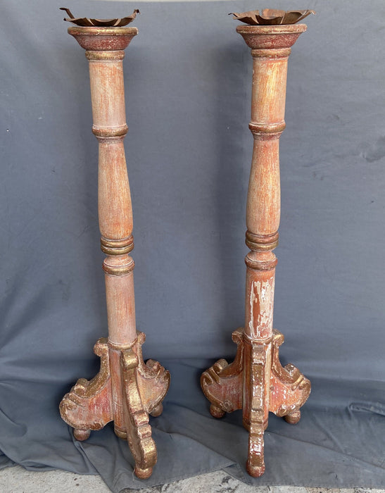 PAIR OF TALL DISTRESSED ORANGE PAINTED CANDLE STANDS
