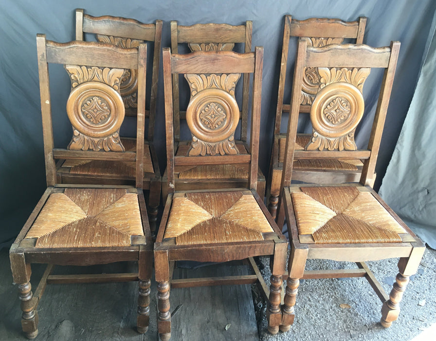 SET OF 6 NEO RENAISSANCE CARVED OAK CHAIRS WITH RUSH WOVEN SEATS