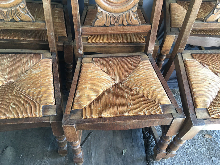 SET OF 6 NEO RENAISSANCE CARVED OAK CHAIRS WITH RUSH WOVEN SEATS