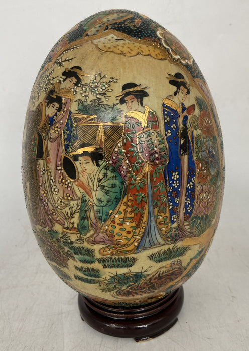 LARGE ASIAN PORCELAIN EGG ON STAND