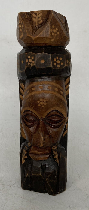 SMALL BLACK AND BROWN WOOD CARVED JAMAICAN STATUE