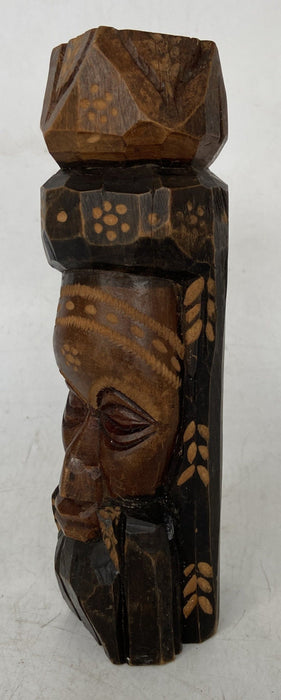 SMALL BLACK AND BROWN WOOD CARVED JAMAICAN STATUE