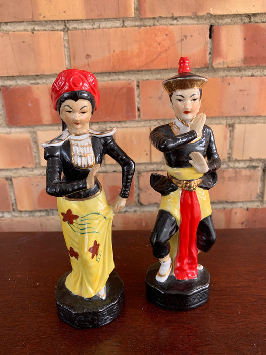 PAIR OF JAPANESE BLACK RED AND YELLOW FIGURES