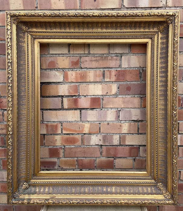 HEAVY GILT FRAME WITH LAURELING