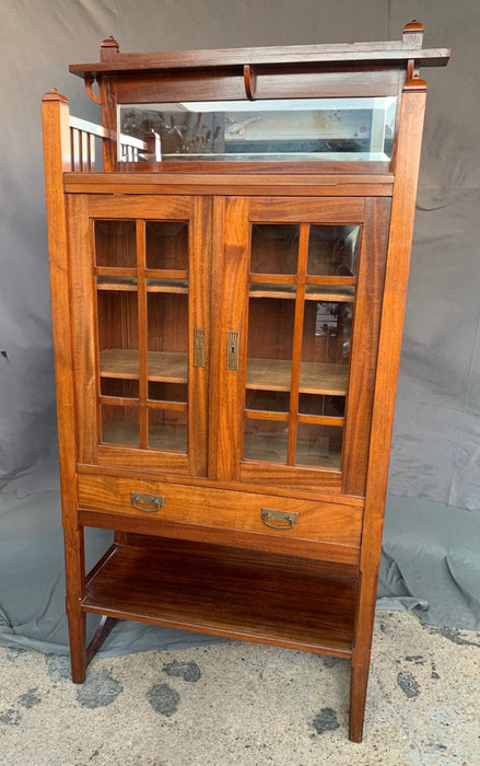 ARTS AND CRAFTS MAHOGANY BOOKCASE WITH BEVELED GLASS